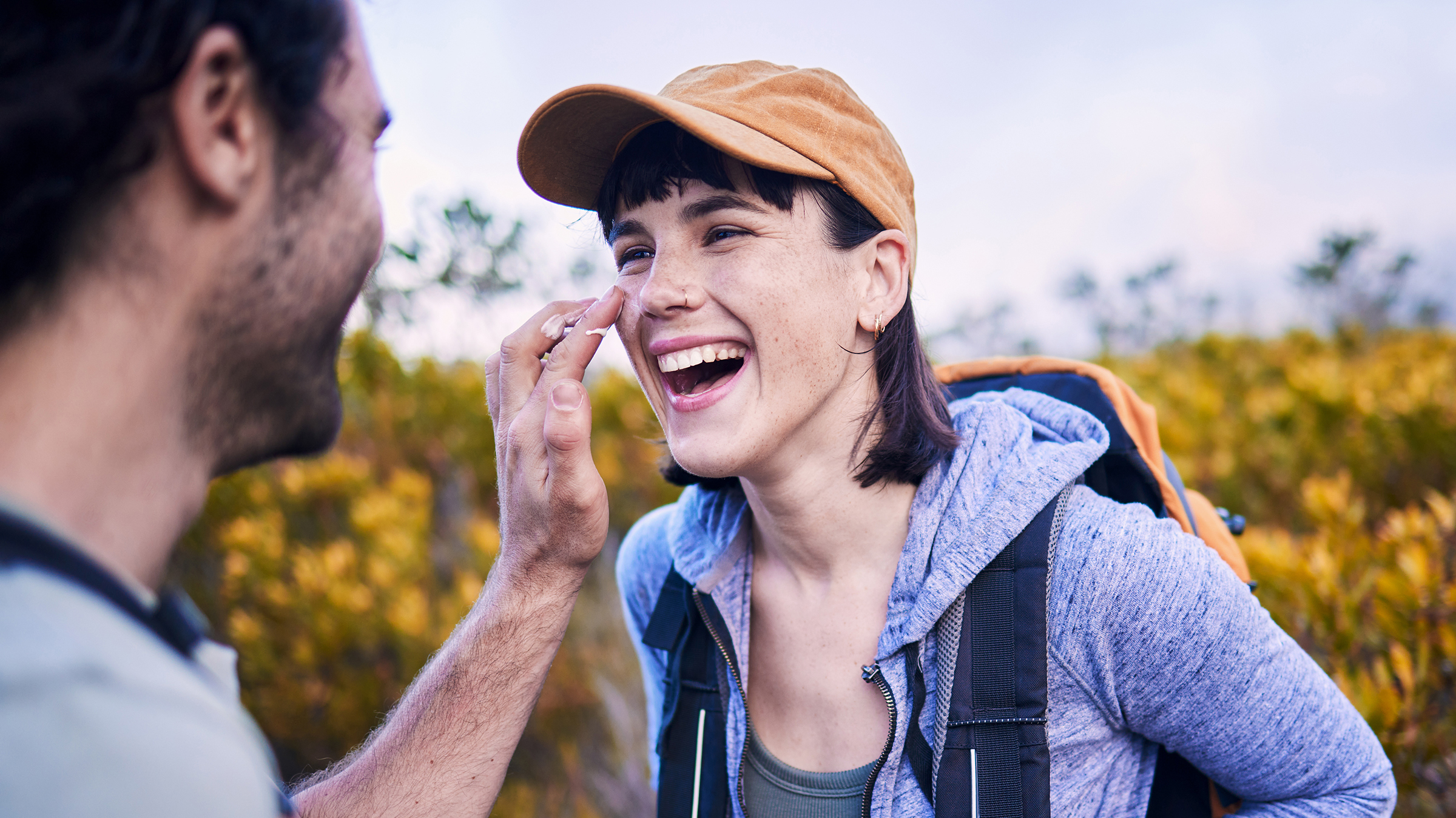 Two people smiling